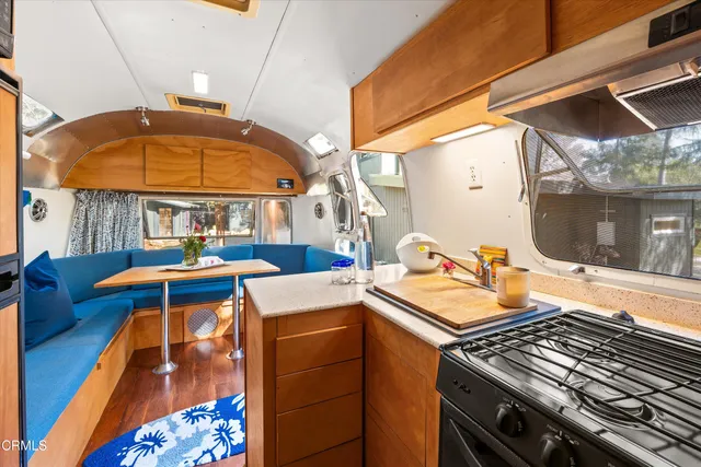 a dinning table and chairs in the patio