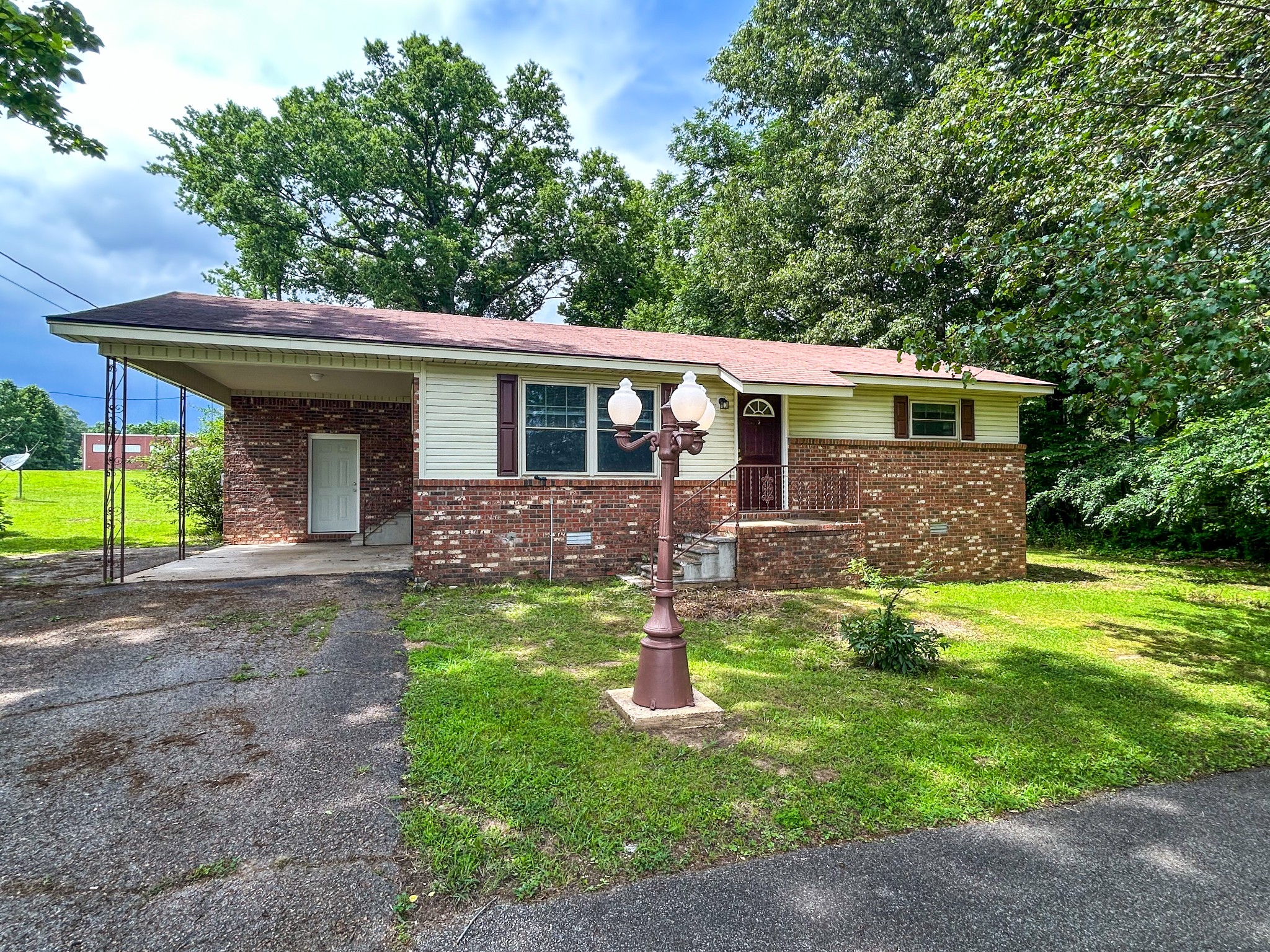 181 Jones Street Huntingdon, TN 38344 - Photo 1 of 21 a front view of house with yard and green space