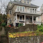a front view of a house with swimming pool