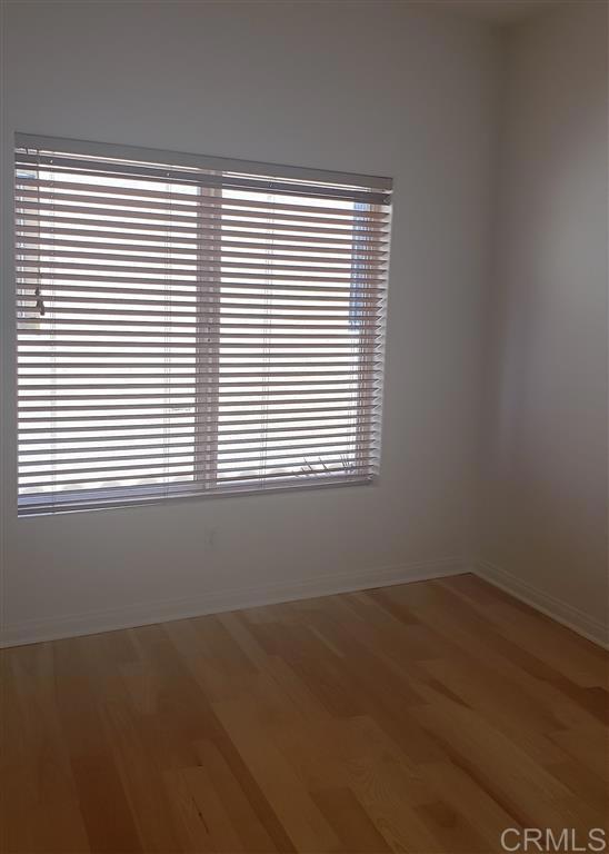 366 Forward Street, Unit E La Jolla, CA 92037 - Photo 19 of 26 an empty room with a window