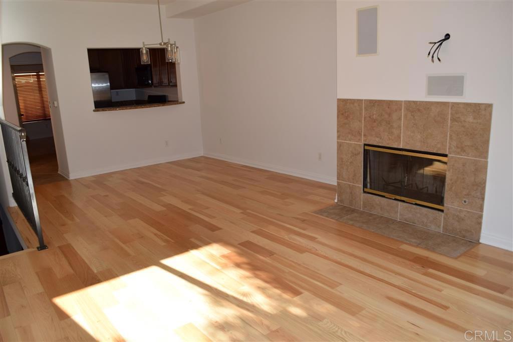 366 Forward Street, Unit E La Jolla, CA 92037 - Photo 4 of 26 a bedroom with a bed and a television