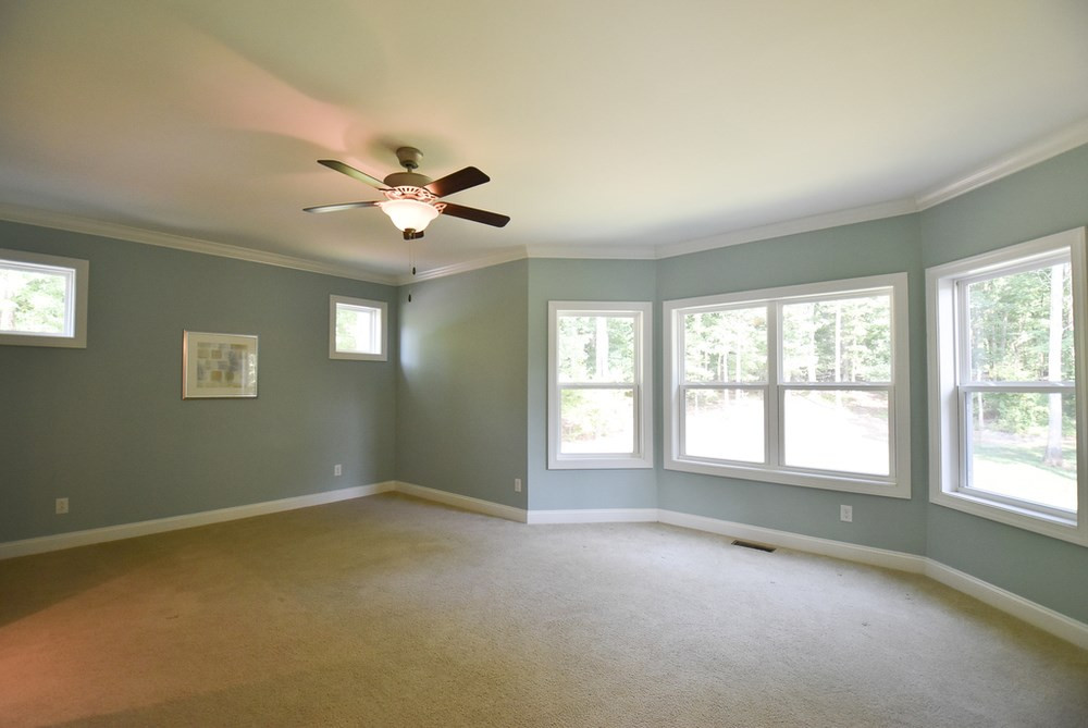 2008 Bowling Green Trail Raleigh, NC 27613 - Photo 19 of 30 The huge Master Bedroom has neutral carpet, crown molding, CF, a bay-windowed sitting area overlooking the backyard & double doors to the huge Master Bath w/fabulous fitted his/hers walk-in closet. Master Bedroom