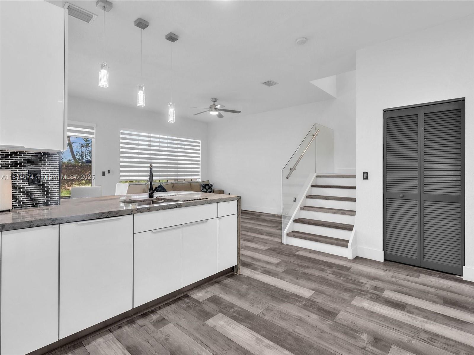 4331 Southwest 124th Way Miramar, FL 33027 - Photo 12 of 58 a bathroom with double vanity sink and a mirror