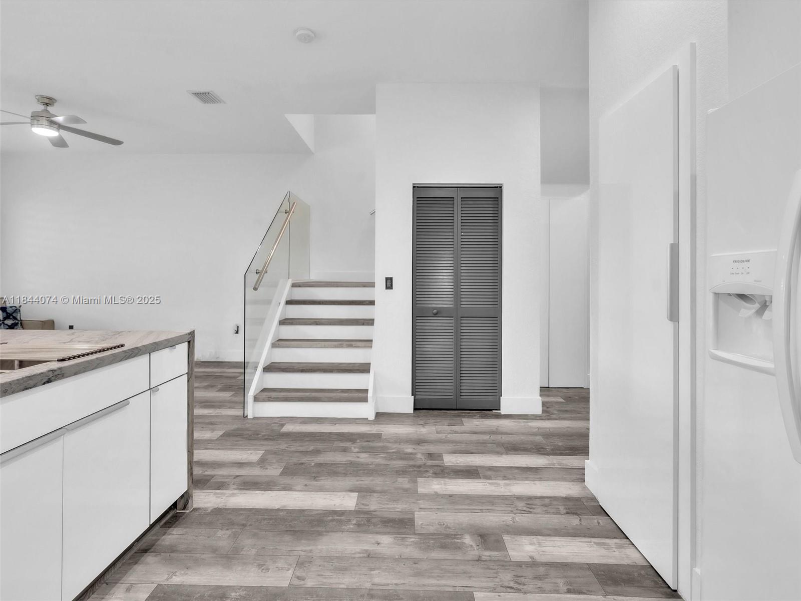 4331 Southwest 124th Way Miramar, FL 33027 - Photo 13 of 58 a view of a hallway with entryway and stairs