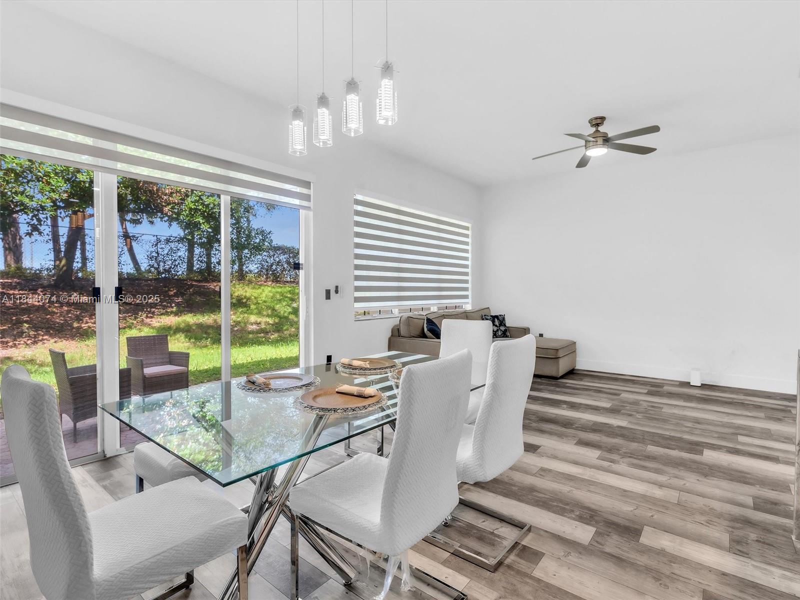 4331 Southwest 124th Way Miramar, FL 33027 - Photo 20 of 58 a view of a dining room with furniture window and outside view