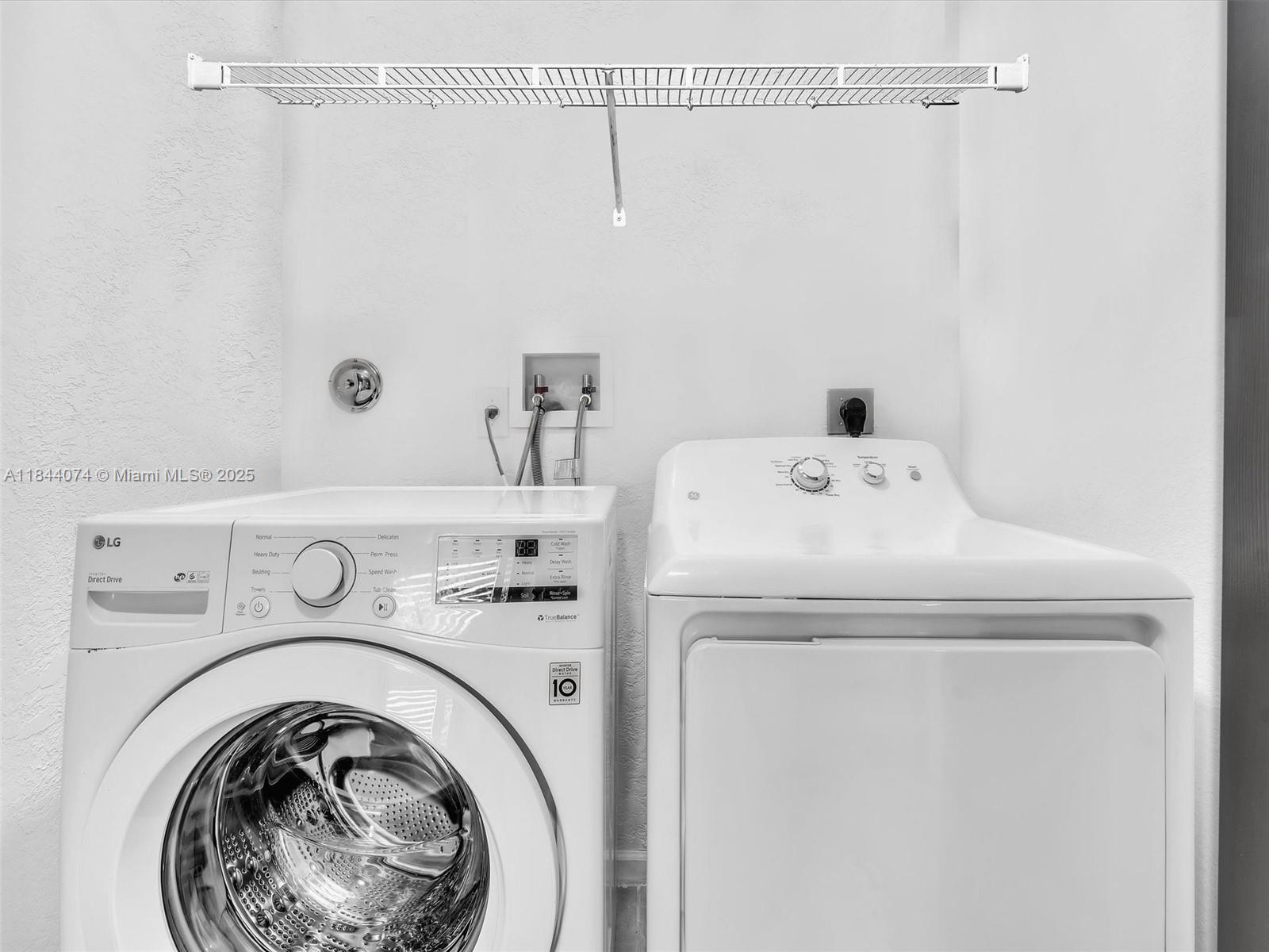 4331 Southwest 124th Way Miramar, FL 33027 - Photo 31 of 58 a utility room with dryer and washer
