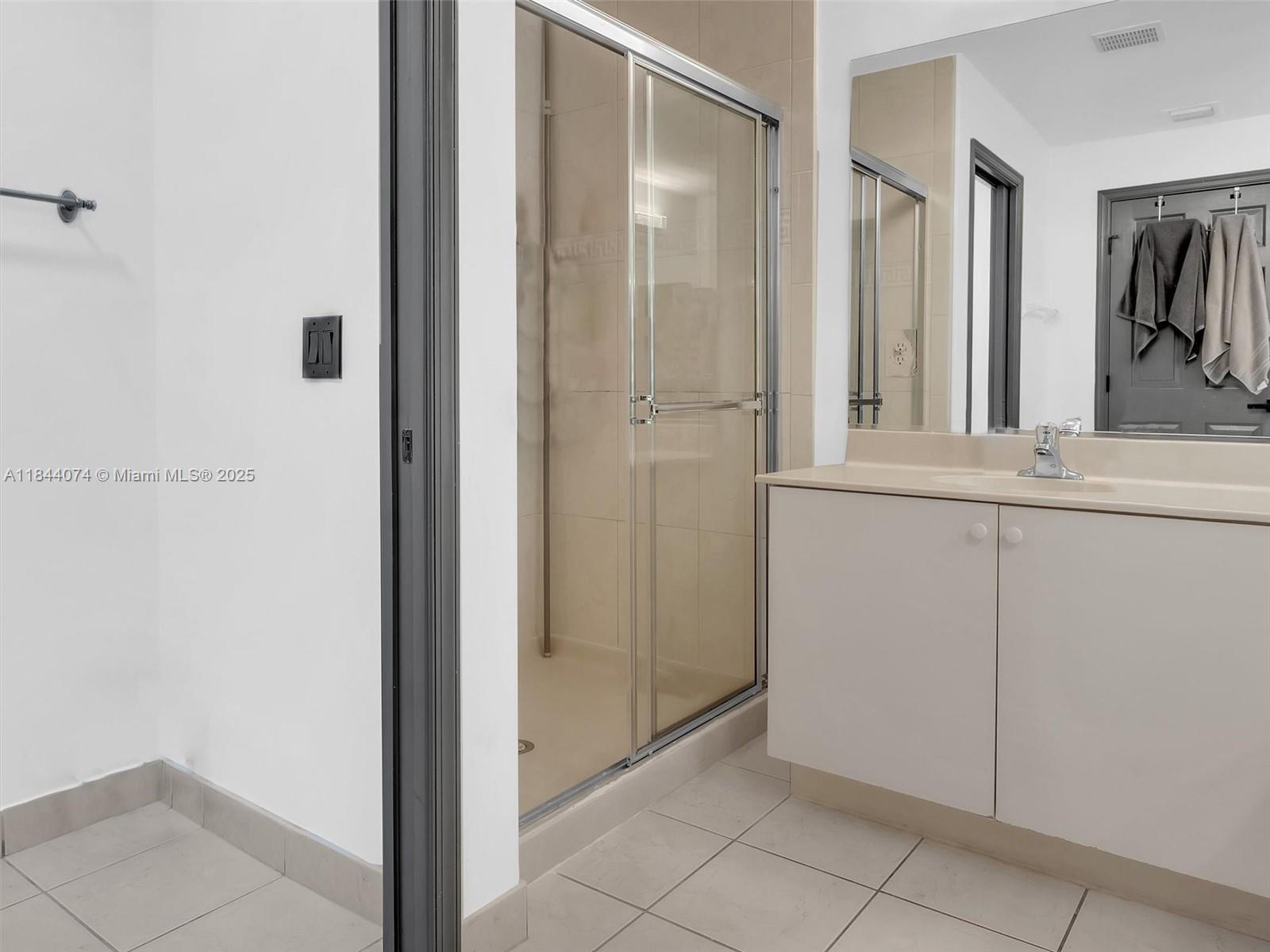 4331 Southwest 124th Way Miramar, FL 33027 - Photo 41 of 58 a view of a bathroom with mirror