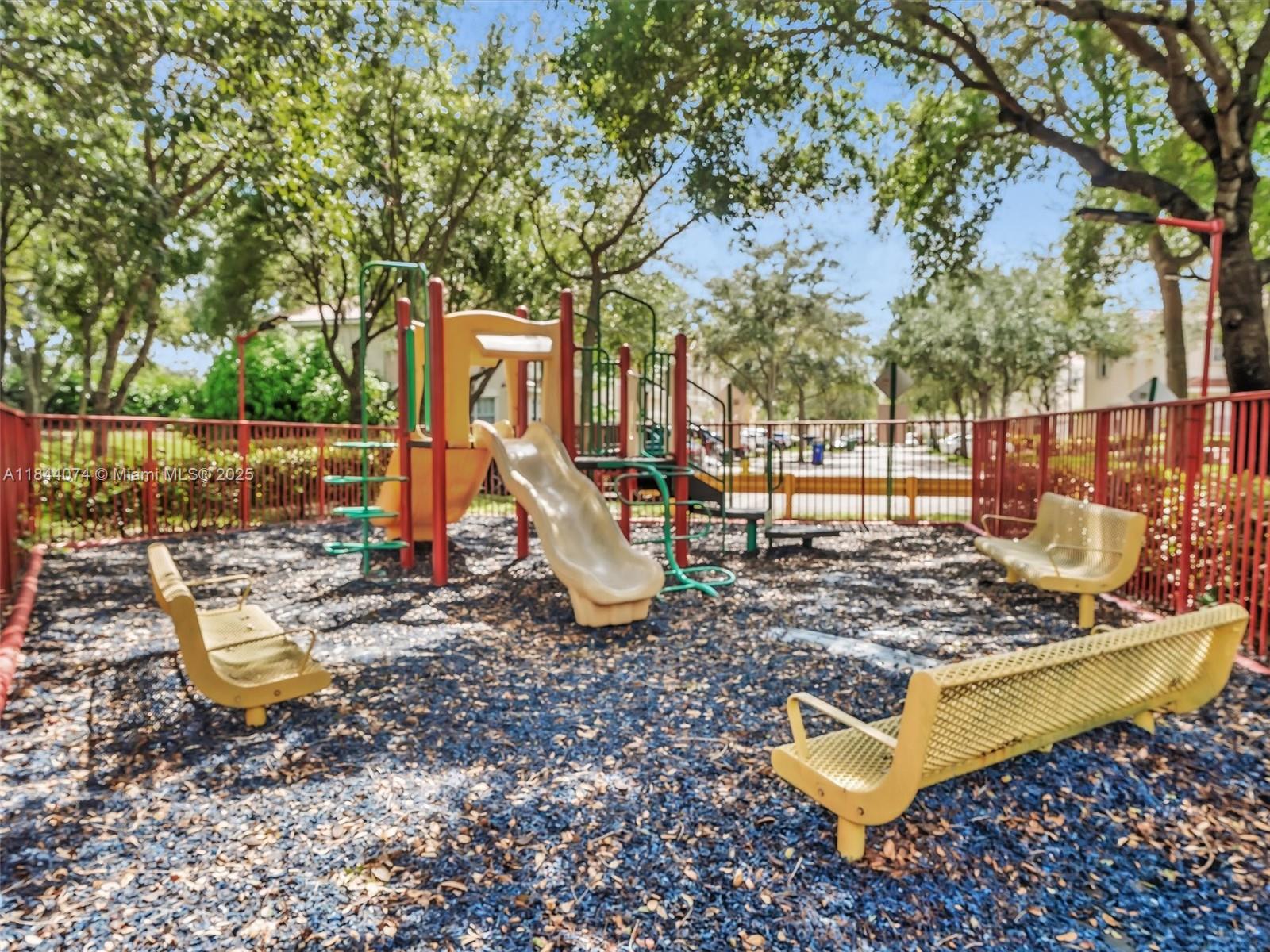 4331 Southwest 124th Way Miramar, FL 33027 - Photo 43 of 58 a view of a park with swings