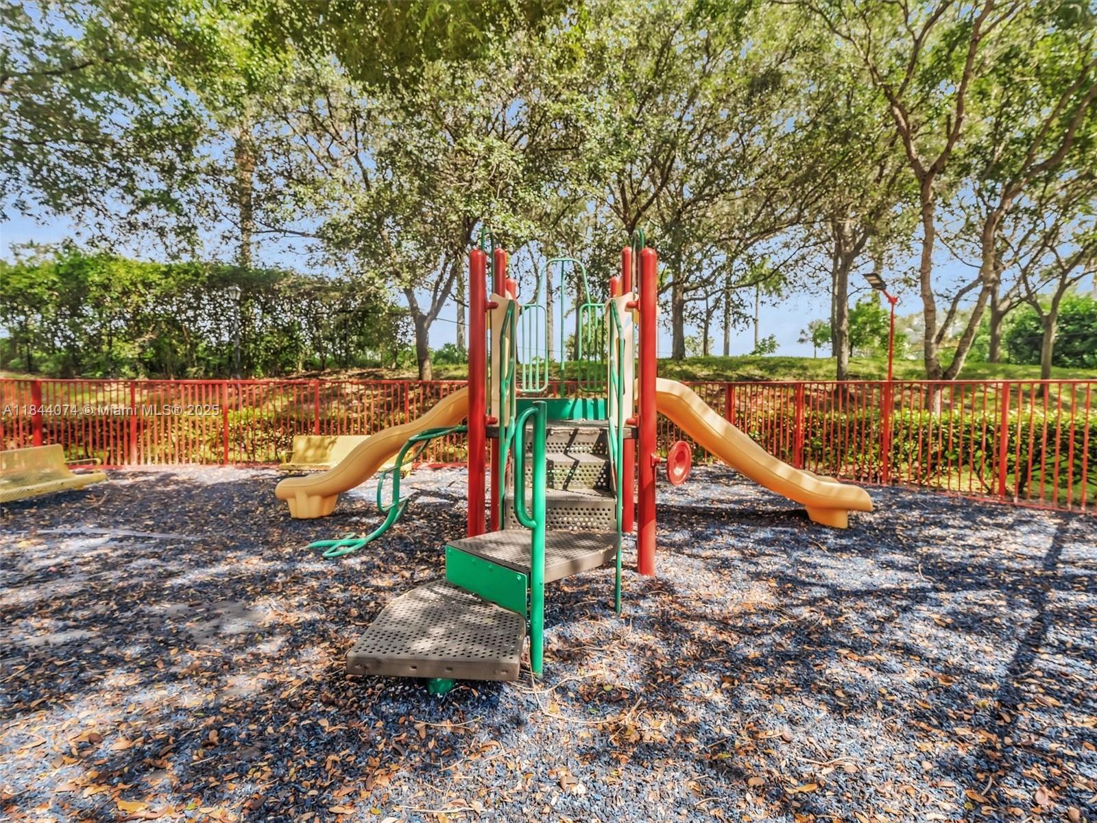 4331 Southwest 124th Way Miramar, FL 33027 - Photo 44 of 58 a view of a park with large trees