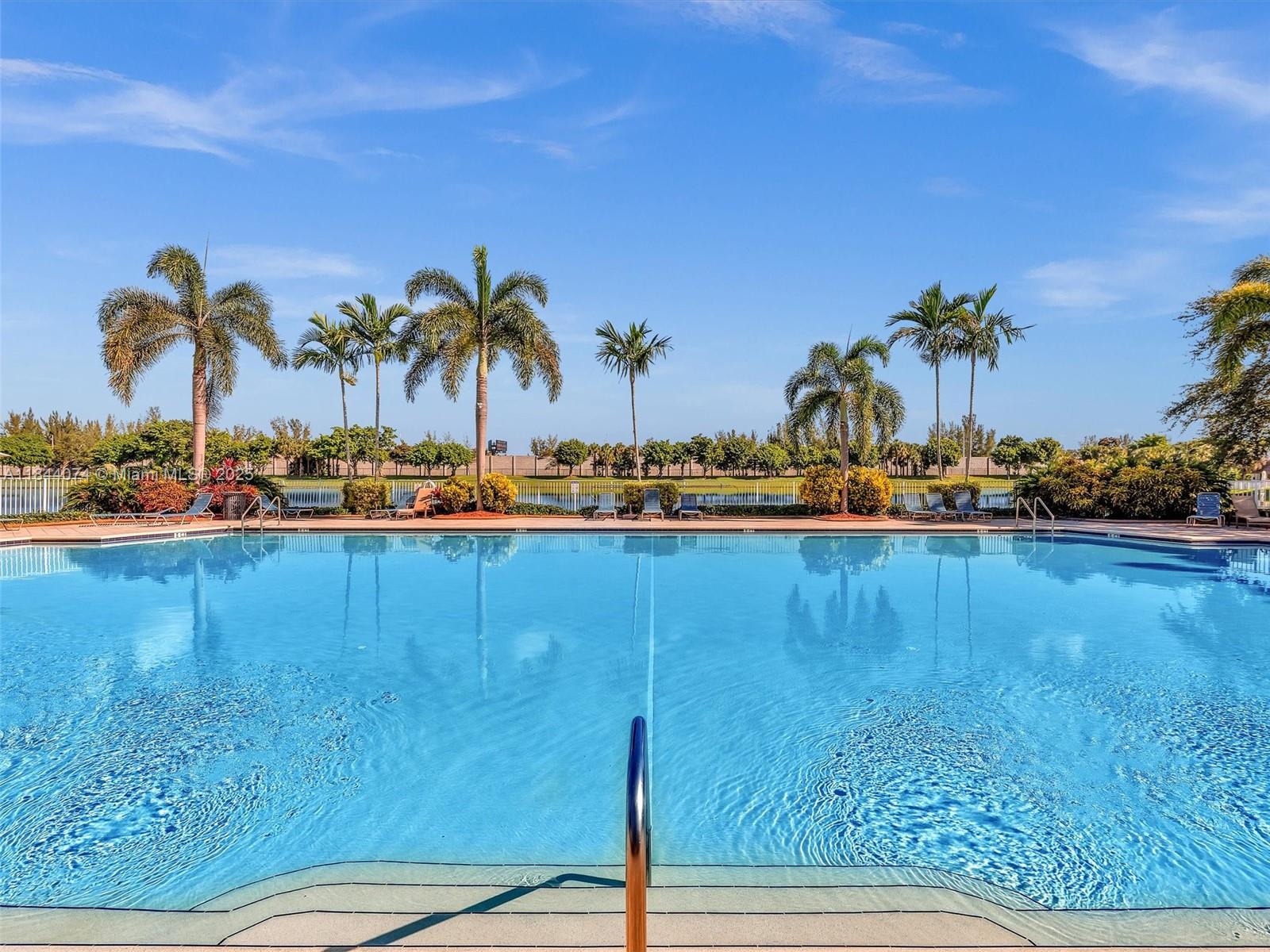 4331 Southwest 124th Way Miramar, FL 33027 - Photo 45 of 58 a view of a lake with palm trees