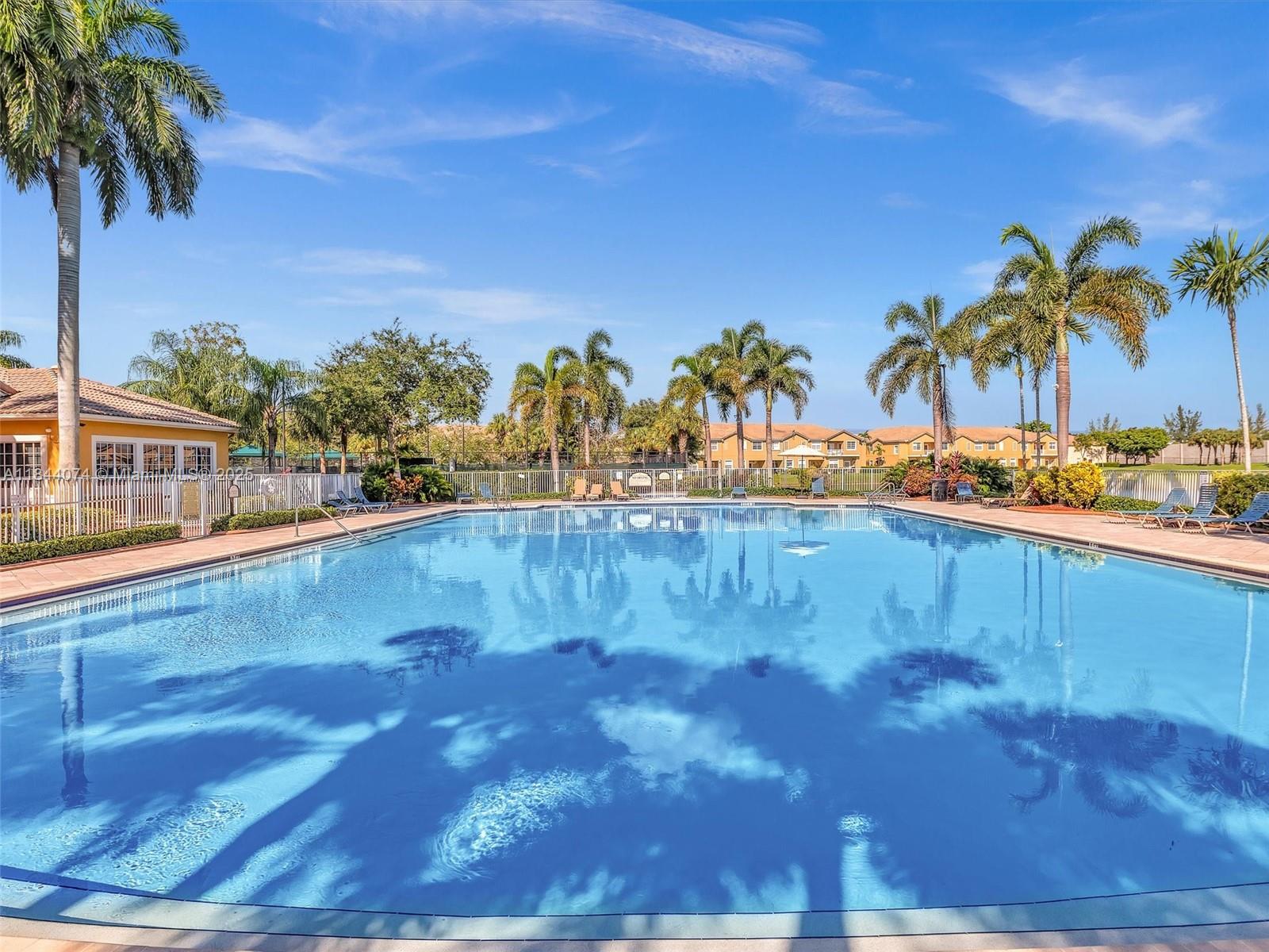 4331 Southwest 124th Way Miramar, FL 33027 - Photo 46 of 58 a view of a swimming pool and a yard