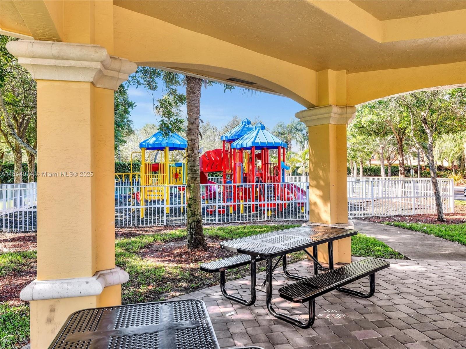 4331 Southwest 124th Way Miramar, FL 33027 - Photo 48 of 58 a bench is sitting in front of house