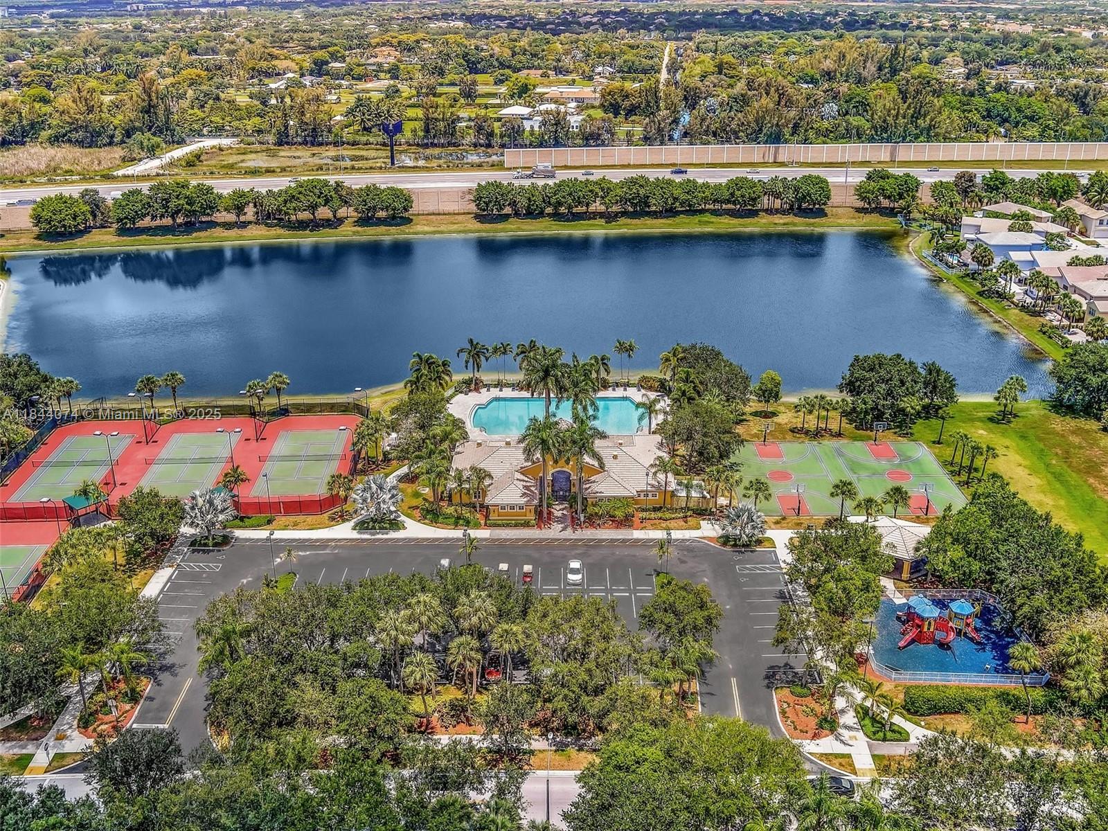 4331 Southwest 124th Way Miramar, FL 33027 - Photo 51 of 58 an aerial view of a house with a lake view