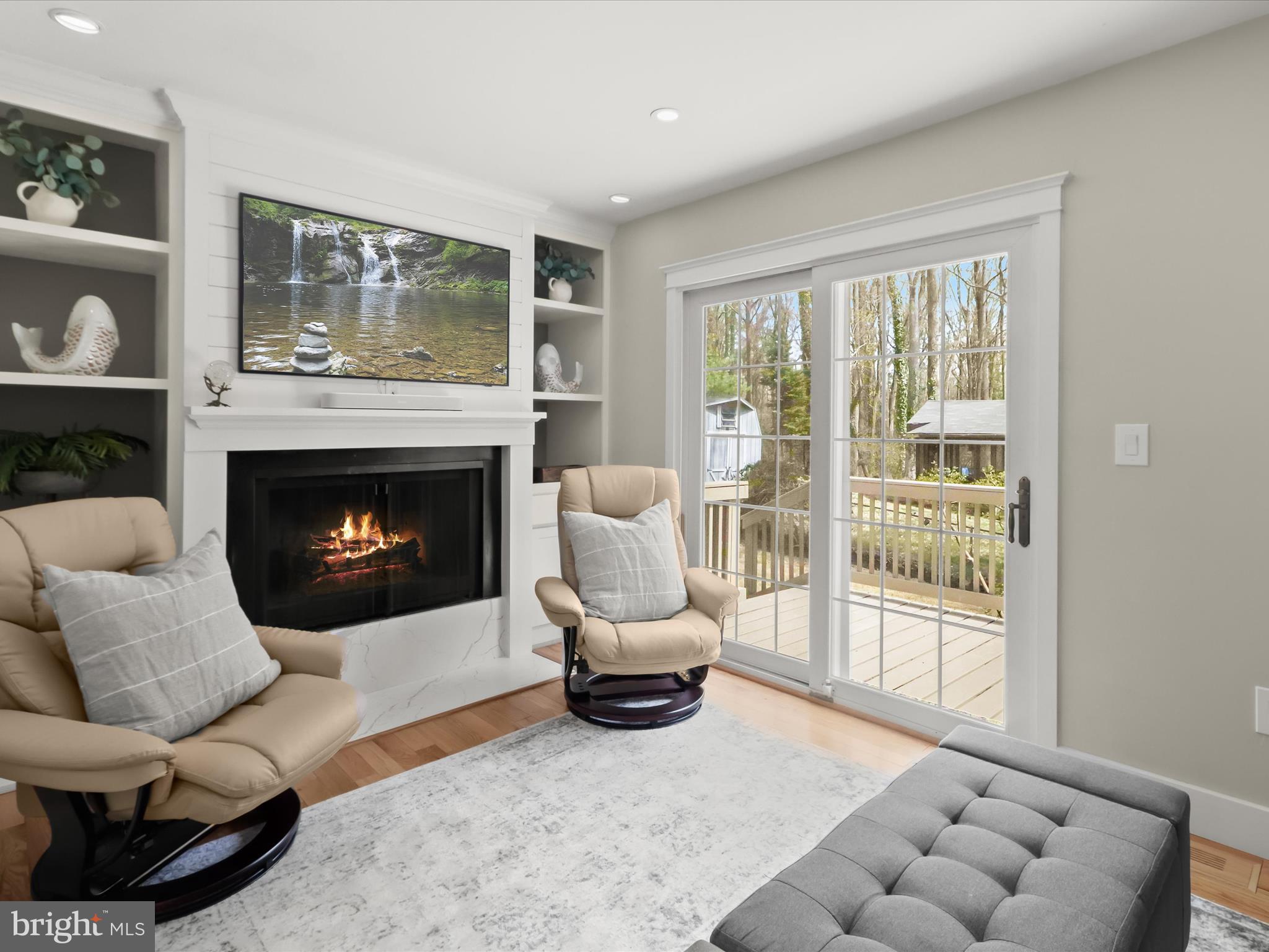 941 Buttonwood Trail Crownsville, MD 21032 - Photo 11 of 43 a living room with furniture a window and a fireplace