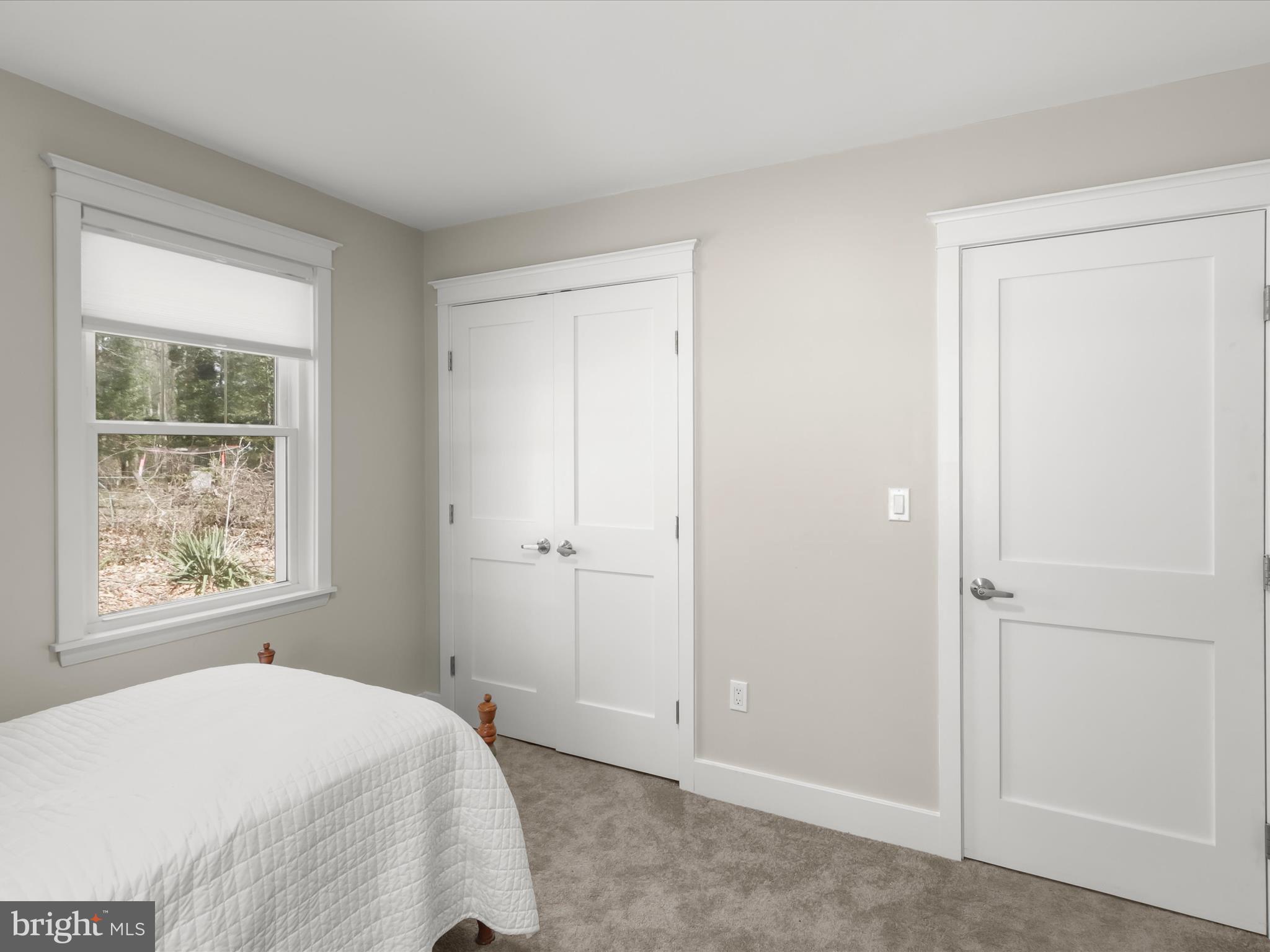 941 Buttonwood Trail Crownsville, MD 21032 - Photo 19 of 43 a bedroom with a bed and a window