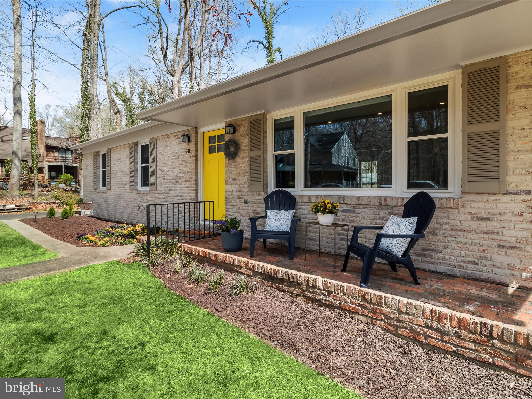 941 Buttonwood Trail Crownsville, MD 21032 - Photo 2 of 43 a view of a house with backyard sitting area and furniture