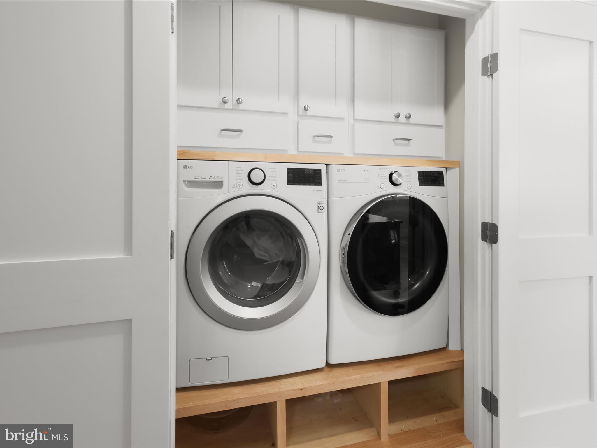 941 Buttonwood Trail Crownsville, MD 21032 - Photo 23 of 43 a view of a storage & utility room with wooden floor