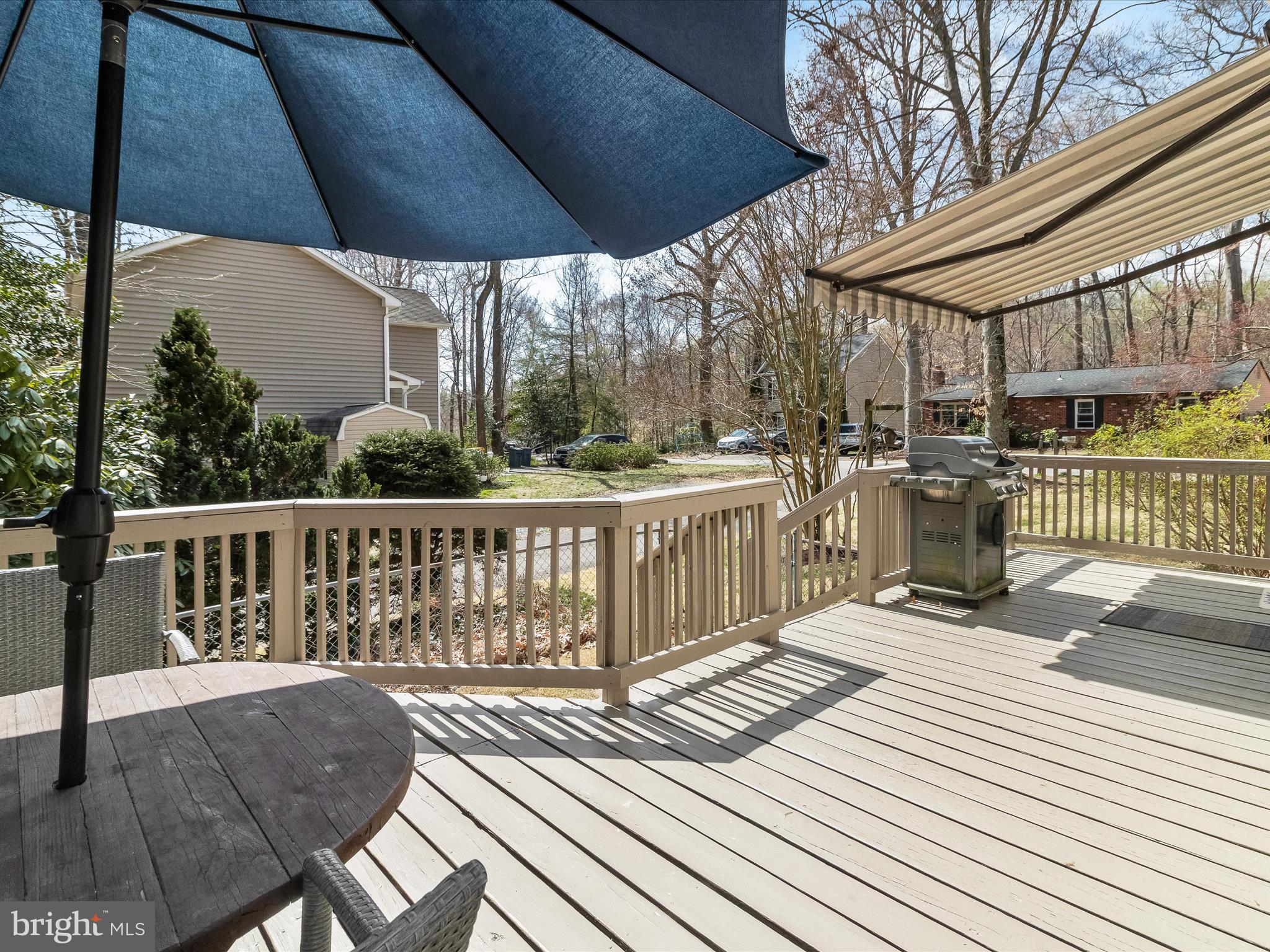 941 Buttonwood Trail Crownsville, MD 21032 - Photo 29 of 43 a view of a wooden chairs on the deck