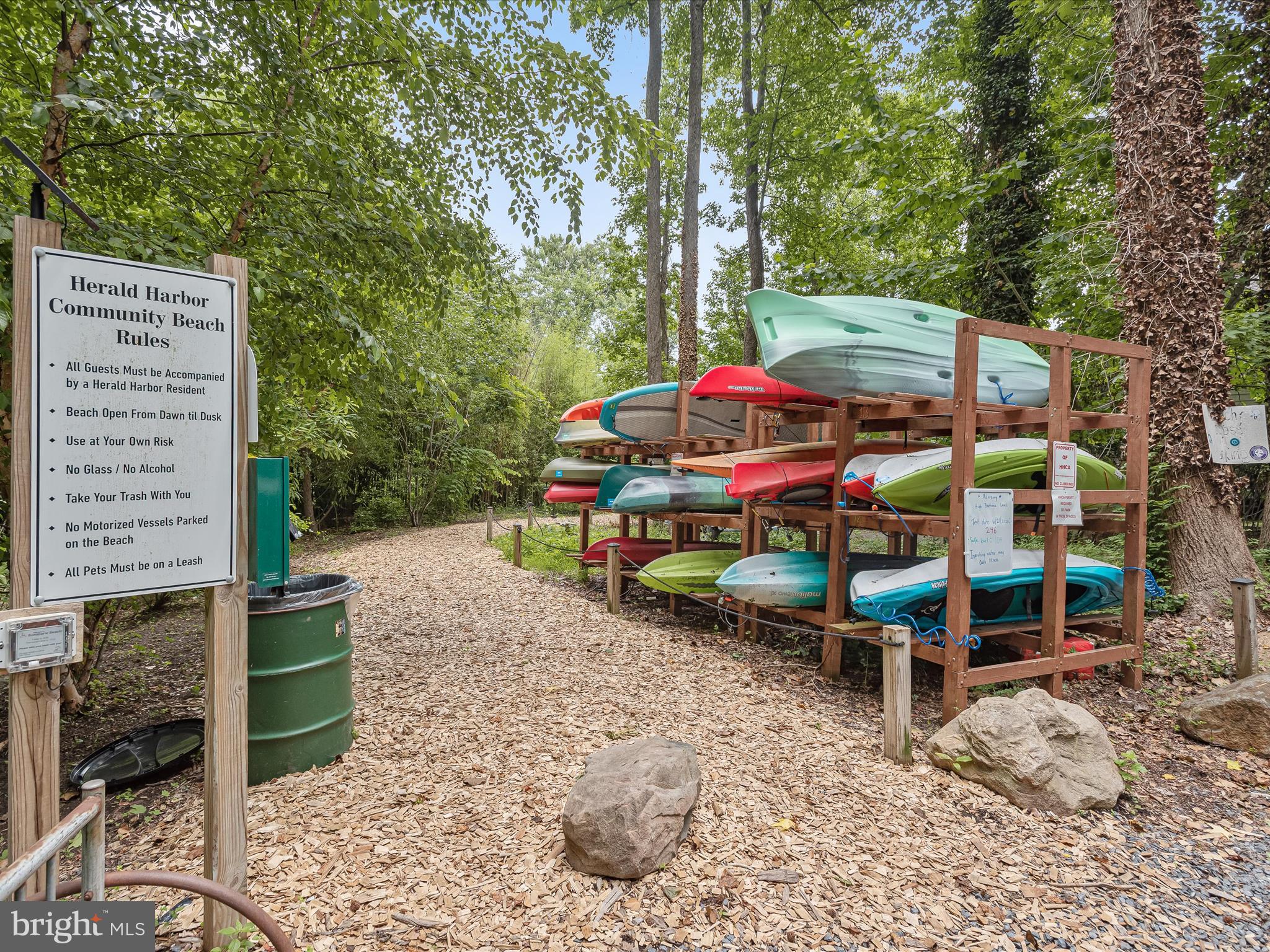 941 Buttonwood Trail Crownsville, MD 21032 - Photo 38 of 43 a view of a patio with table and chairs under an umbrella