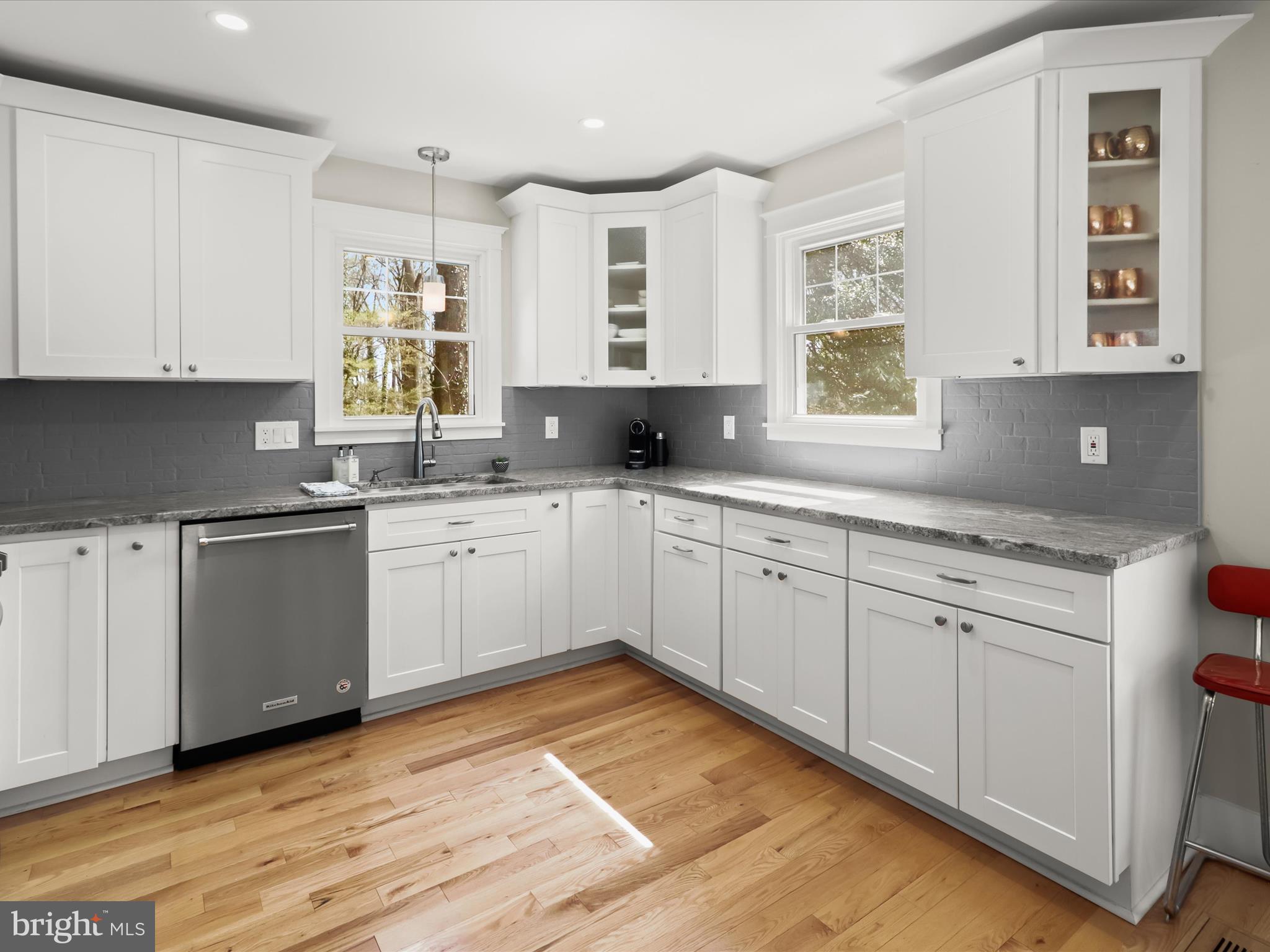941 Buttonwood Trail Crownsville, MD 21032 - Photo 4 of 43 a kitchen with a sink window and cabinets