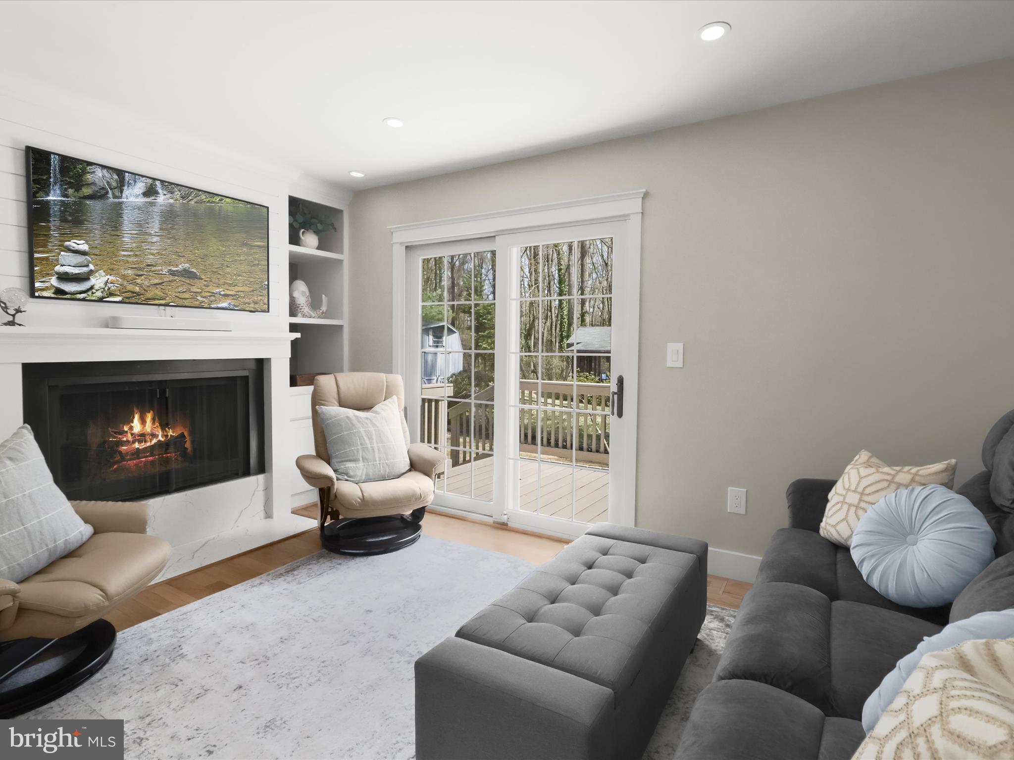 941 Buttonwood Trail Crownsville, MD 21032 - Photo 10 of 43 a living room with furniture and a fireplace