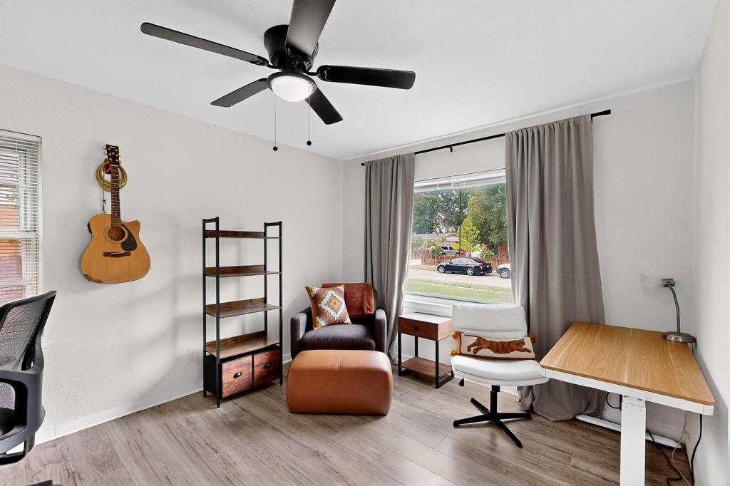 10834 Cassandra Way Dallas, TX 75228 - Photo 17 of 20 a living room with furniture and a window