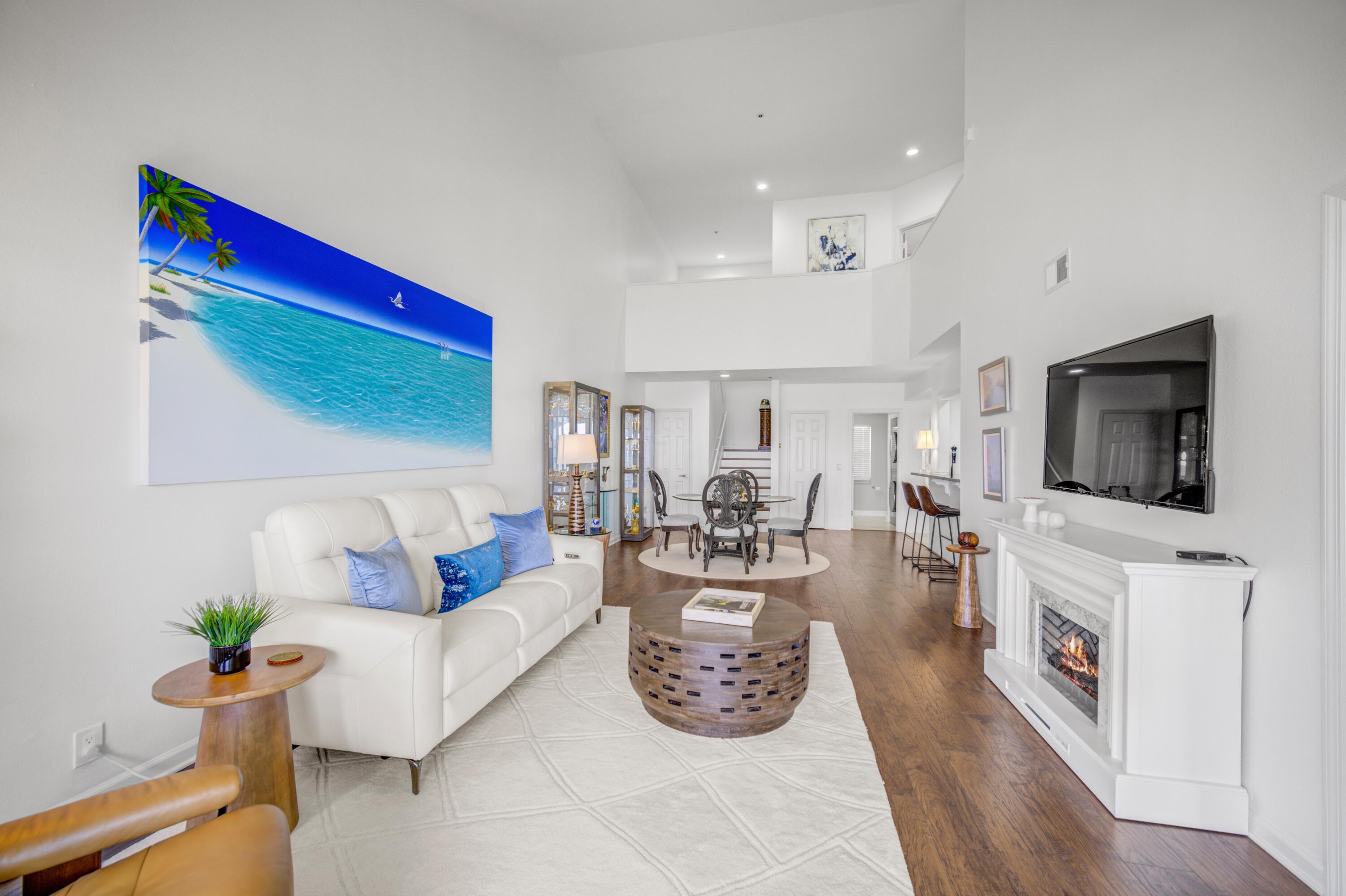 25 Players Club, Unit 25 Miramar Beach, FL 32550 - Photo 19 of 44 Living room and upstairs