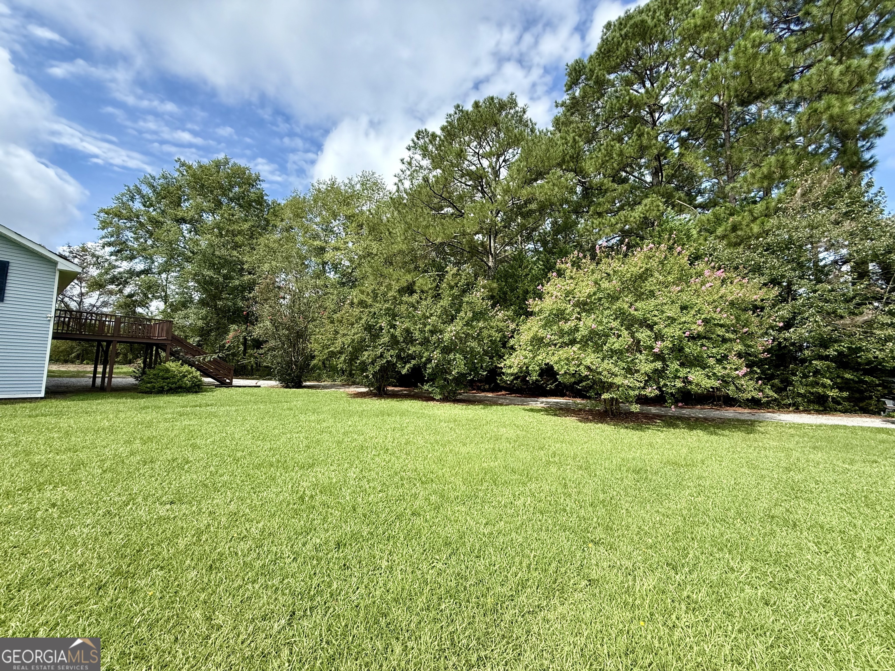2592 White Oak Road Thomson, GA 30824 - Photo 28 of 30 a view of a field of grass and trees