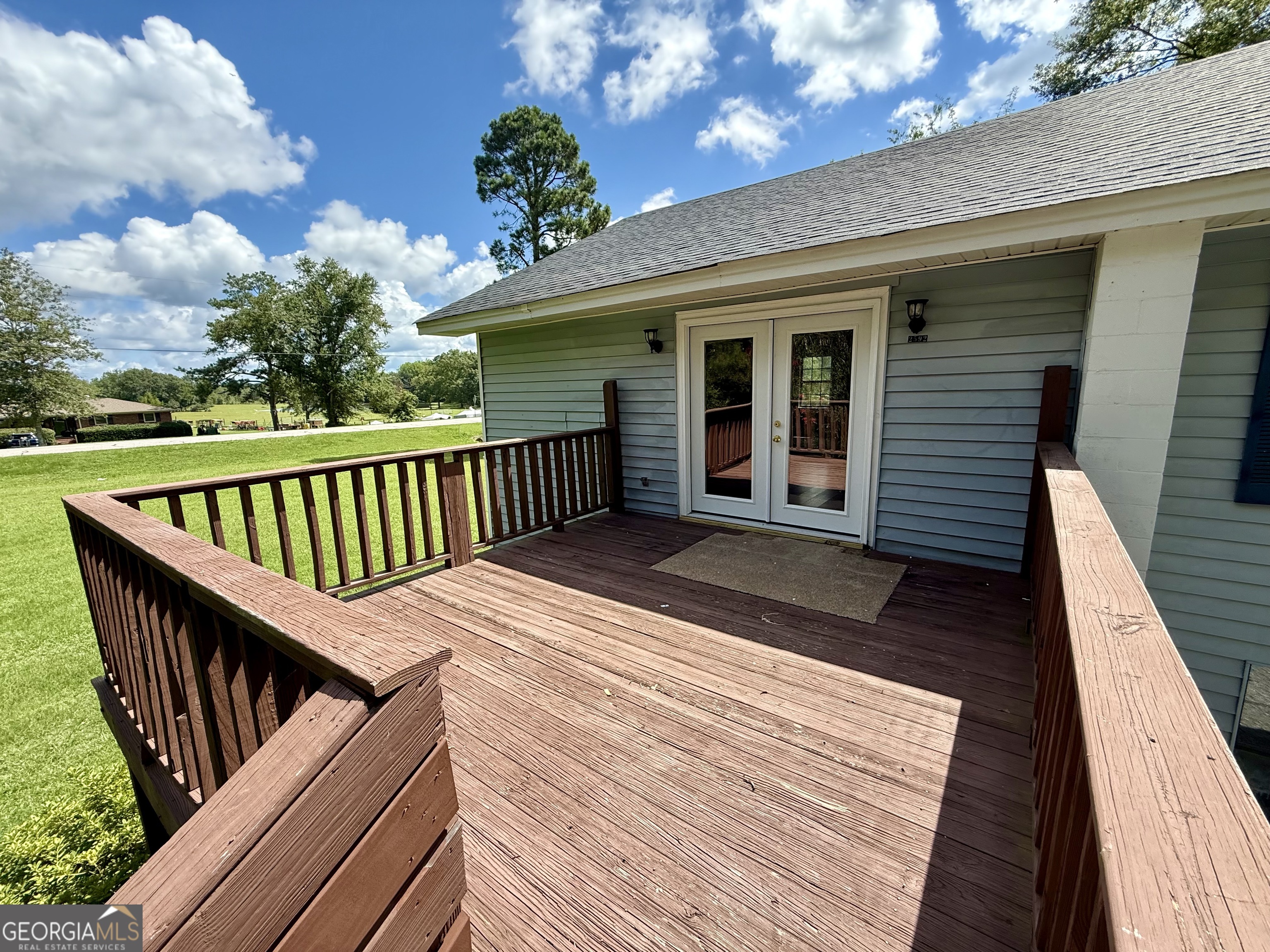 2592 White Oak Road Thomson, GA 30824 - Photo 30 of 30 a balcony with wooden floor potted plants and wooden floor