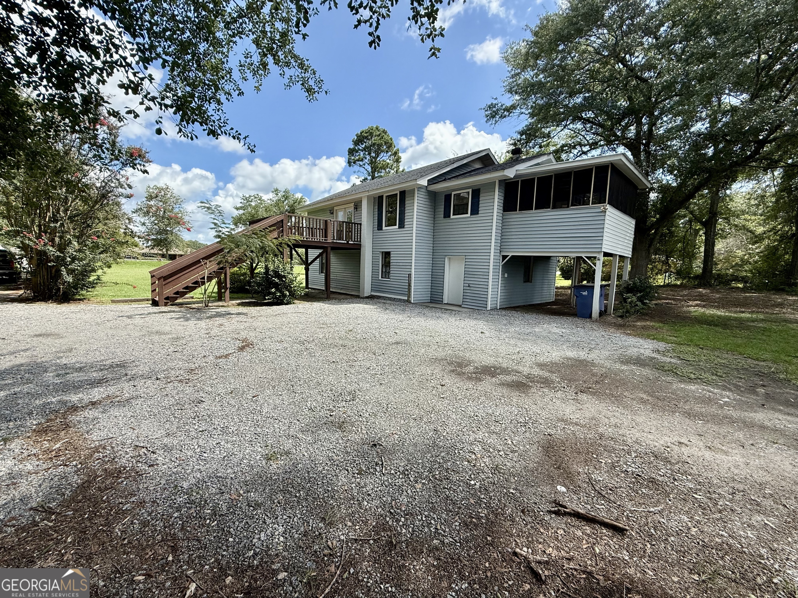2592 White Oak Road Thomson, GA 30824 - Photo 3 of 30 a front view of a house with a yard