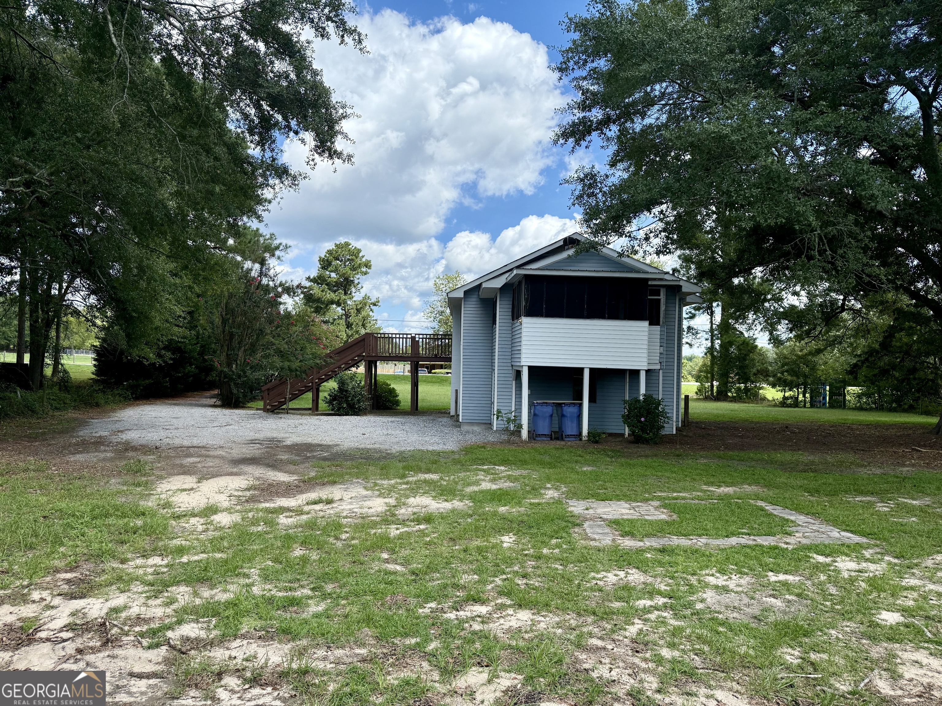 2592 White Oak Road Thomson, GA 30824 - Photo 4 of 30 a view of a house with a yard