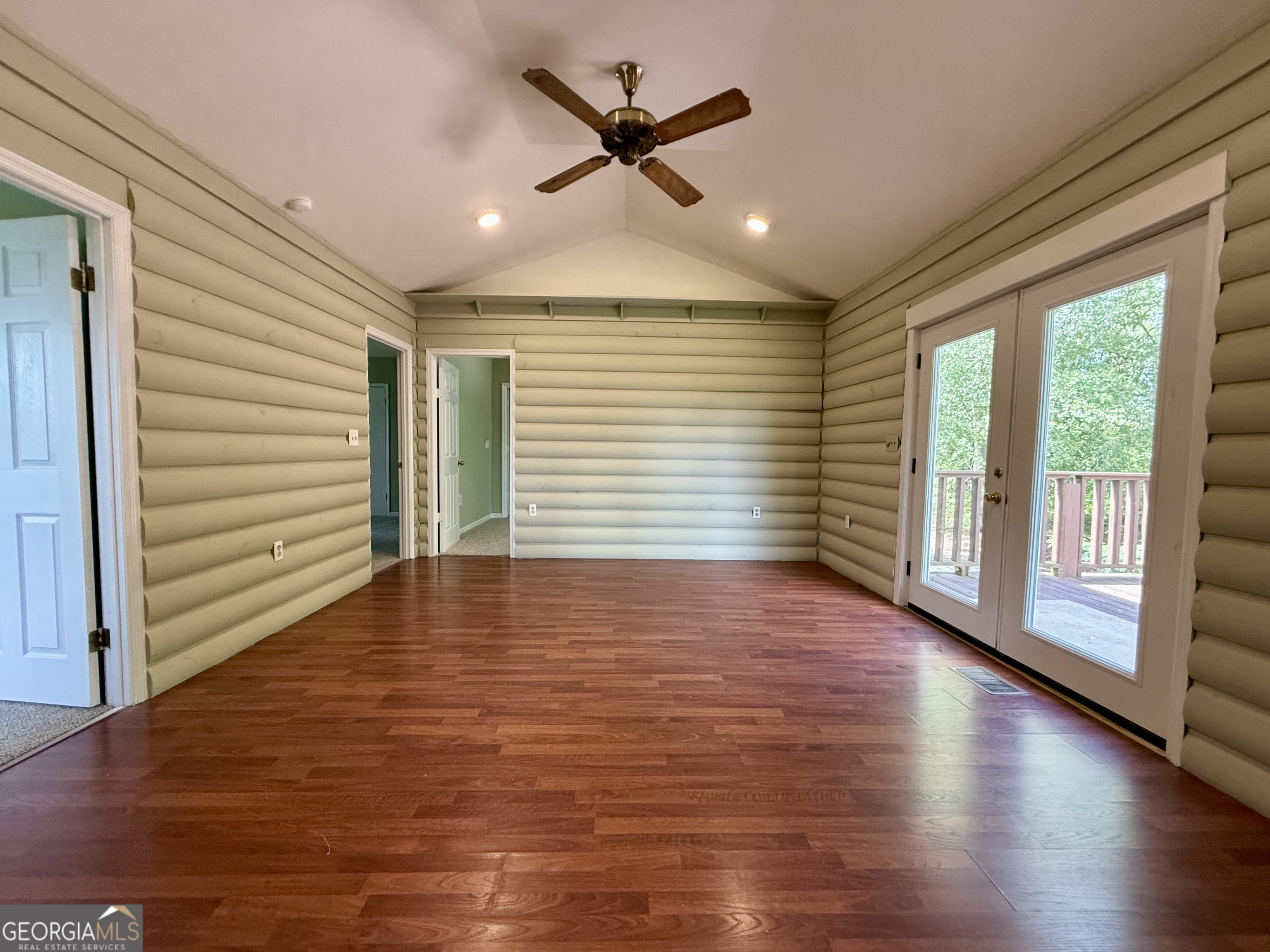 2592 White Oak Road Thomson, GA 30824 - Photo 5 of 30 a view of empty room with wooden floor and fan