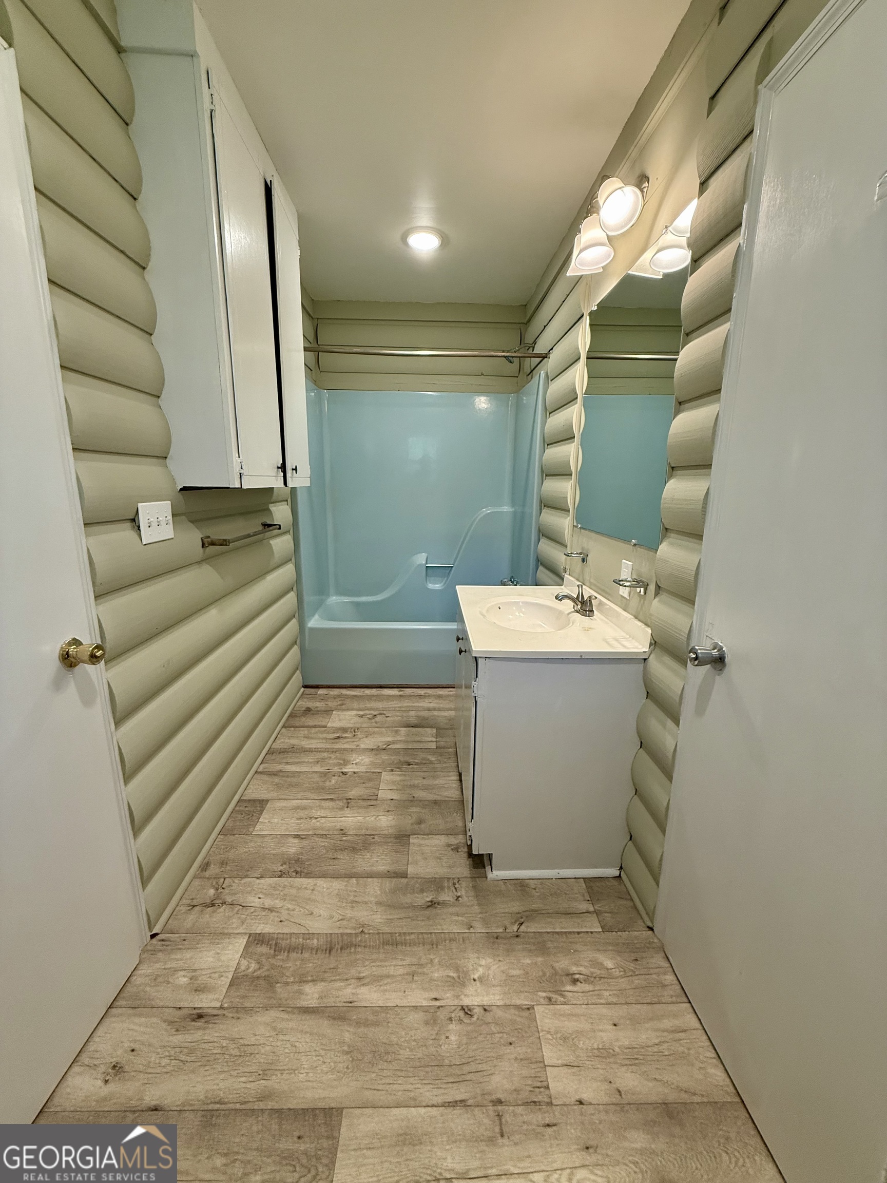 2592 White Oak Road Thomson, GA 30824 - Photo 9 of 30 a bathroom with a sink a toilet and mirror
