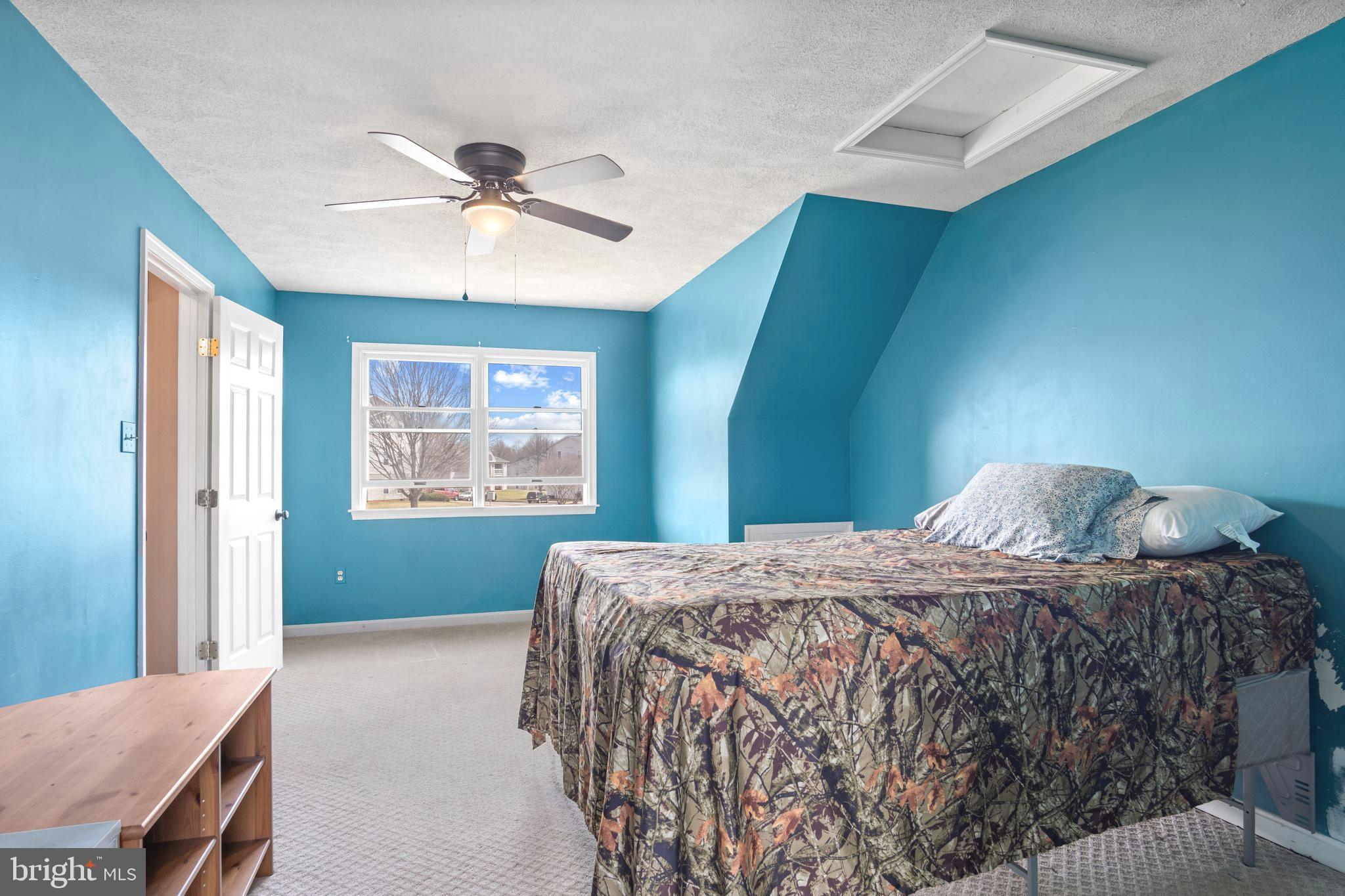 1636 Harrier Lane Culpeper, VA 22701 - Photo 11 of 19 a bedroom with a bed and window
