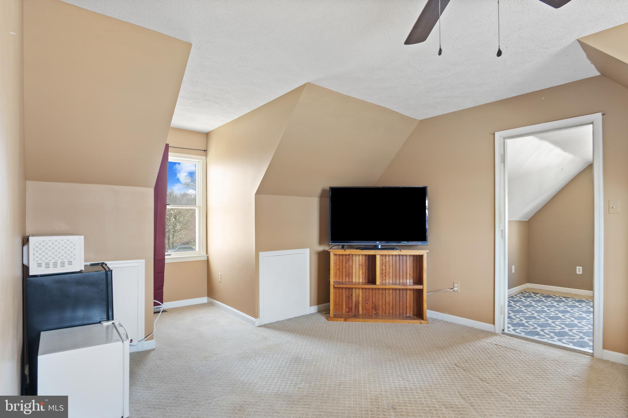 1636 Harrier Lane Culpeper, VA 22701 - Photo 14 of 19 a living room with furniture and a flat screen tv
