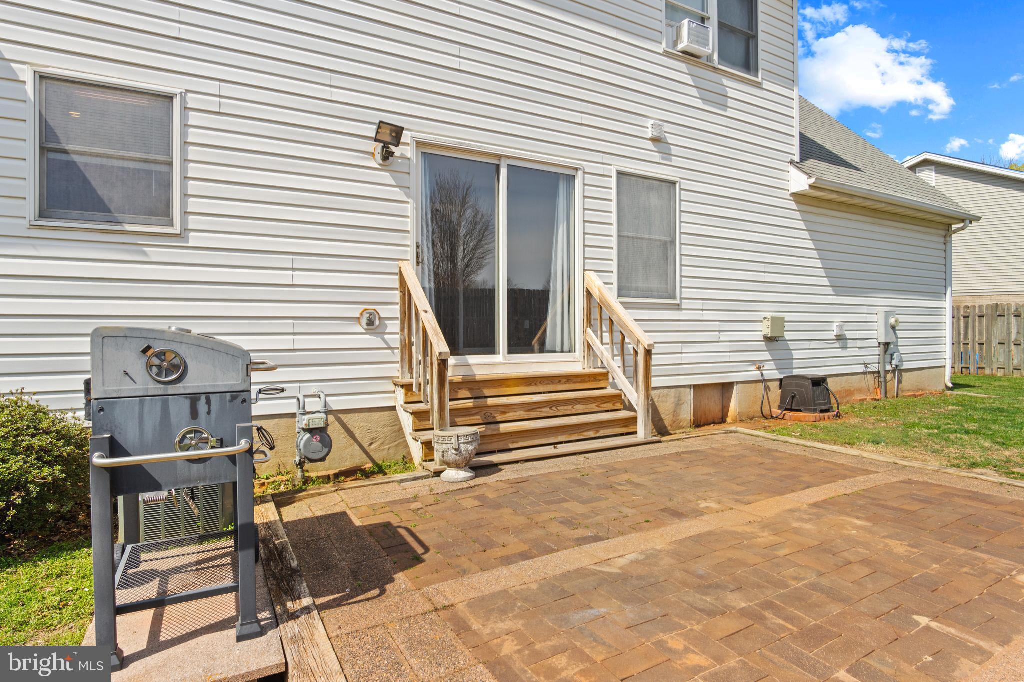 1636 Harrier Lane Culpeper, VA 22701 - Photo 18 of 19 a view of a house with backyard and a chair