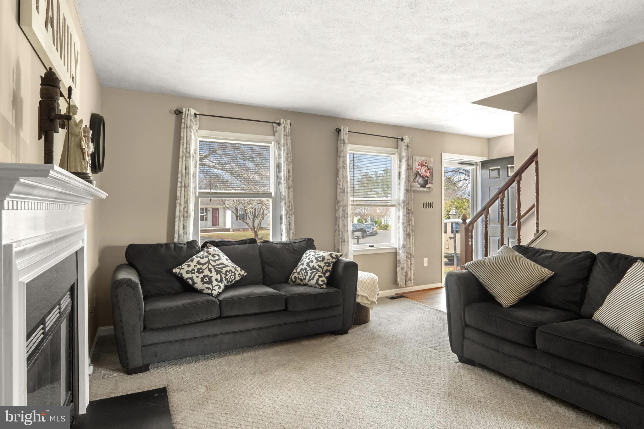1636 Harrier Lane Culpeper, VA 22701 - Photo 3 of 19 a living room with furniture and a fireplace