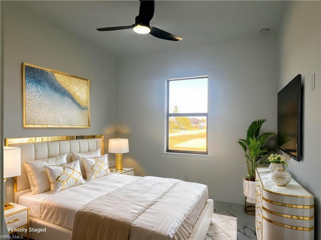 3510 15th Street Southwest Lehigh Acres, FL 33976 - Photo 12 of 50 Bedroom featuring baseboards and a ceiling fan