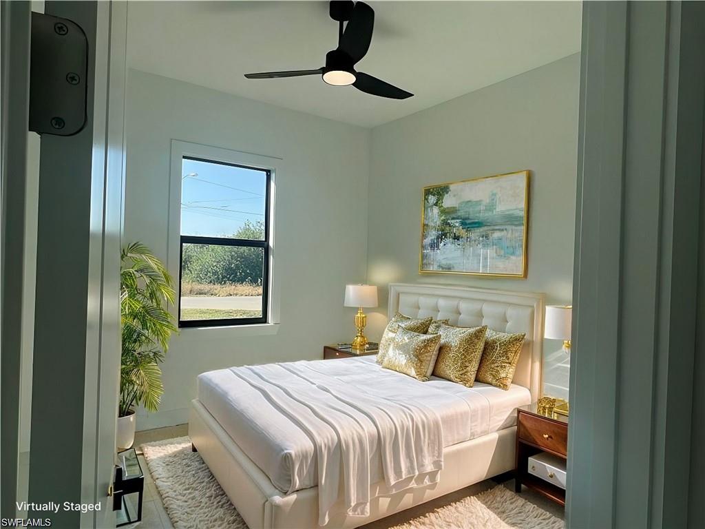 3510 15th Street Southwest Lehigh Acres, FL 33976 - Photo 14 of 50 Bedroom with ceiling fan