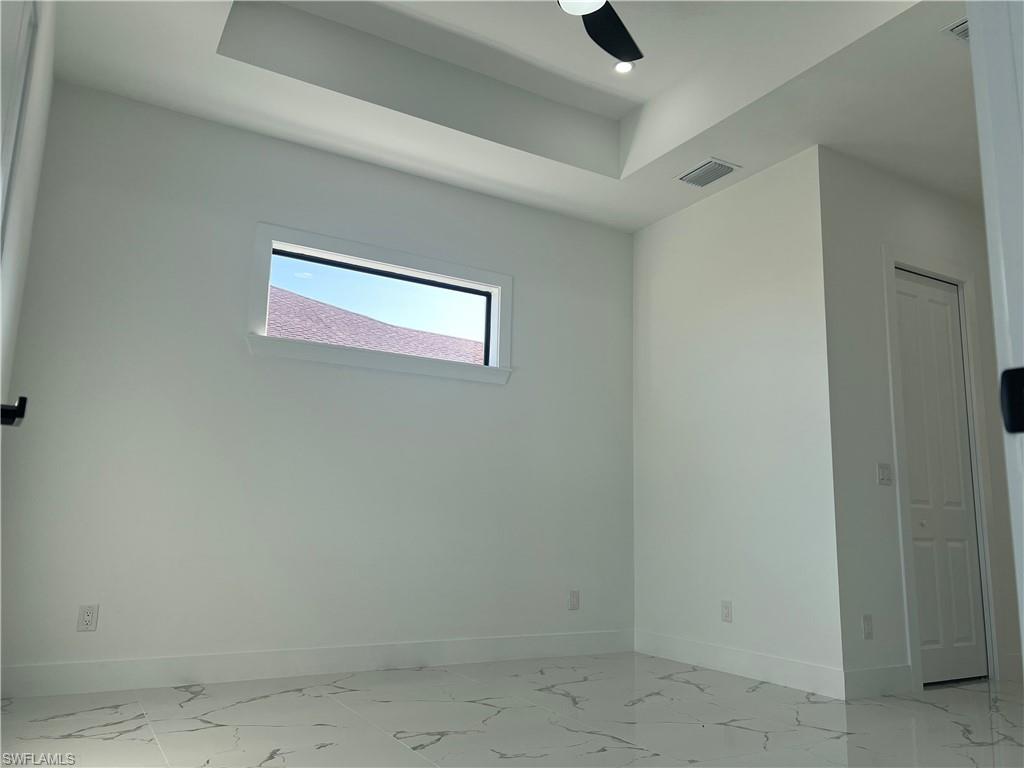 3510 15th Street Southwest Lehigh Acres, FL 33976 - Photo 28 of 50 Spare room featuring ceiling fan