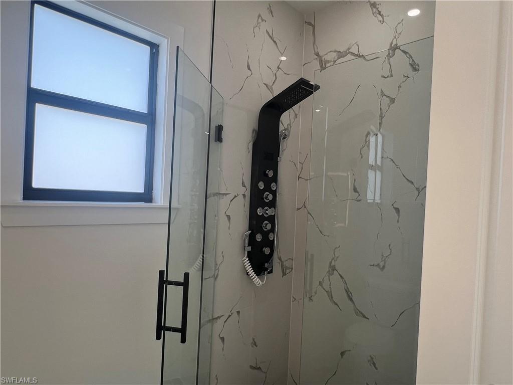 3510 15th Street Southwest Lehigh Acres, FL 33976 - Photo 48 of 50 Bathroom with a shower with door