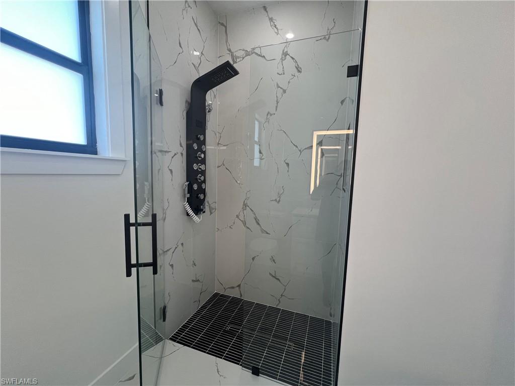 3510 15th Street Southwest Lehigh Acres, FL 33976 - Photo 49 of 50 Bathroom featuring walk in shower