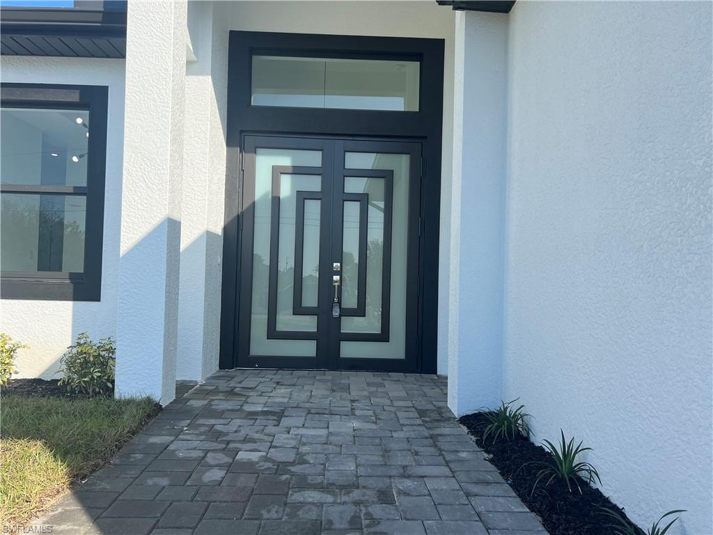 3510 15th Street Southwest Lehigh Acres, FL 33976 - Photo 7 of 50 Property entrance featuring french doors