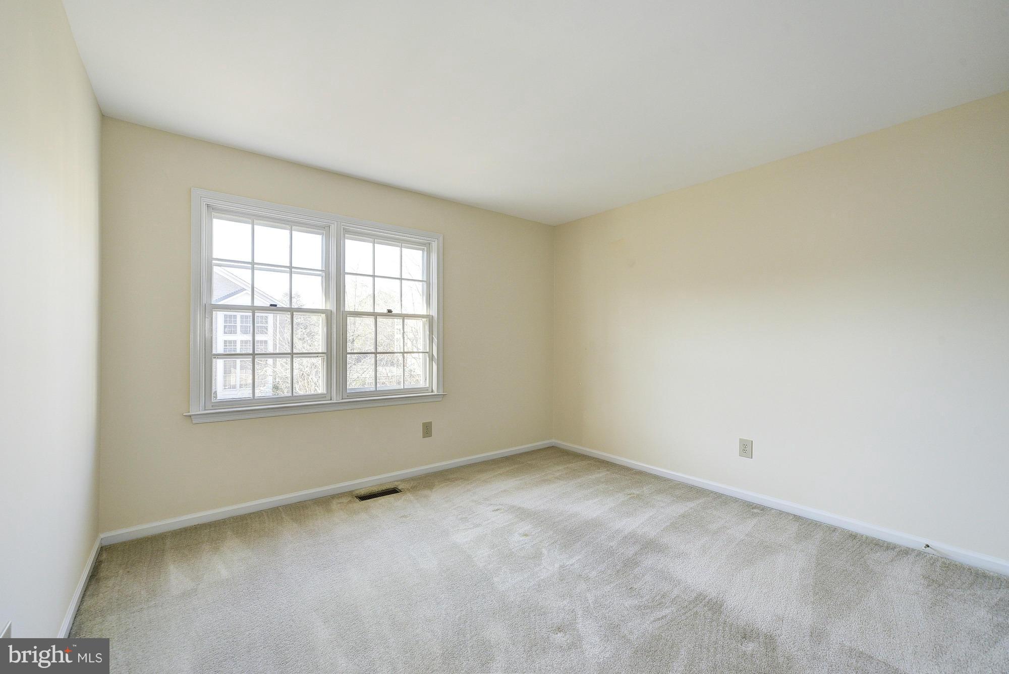 8023 Rising Ridge Road Bethesda, MD 20817 - Photo 18 of 30 an empty room with a window
