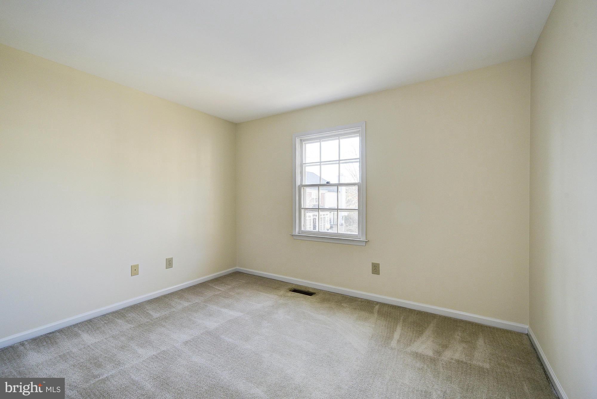 8023 Rising Ridge Road Bethesda, MD 20817 - Photo 20 of 30 an empty room with a window