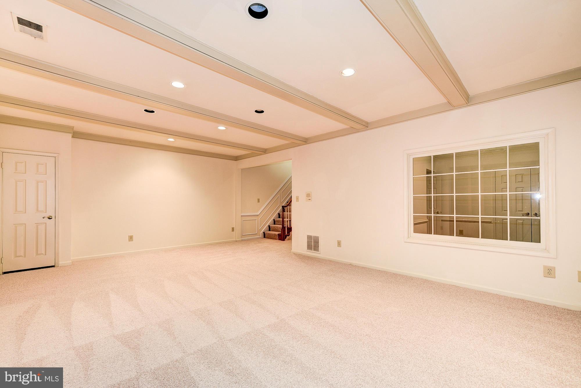 8023 Rising Ridge Road Bethesda, MD 20817 - Photo 24 of 30 an empty room with windows