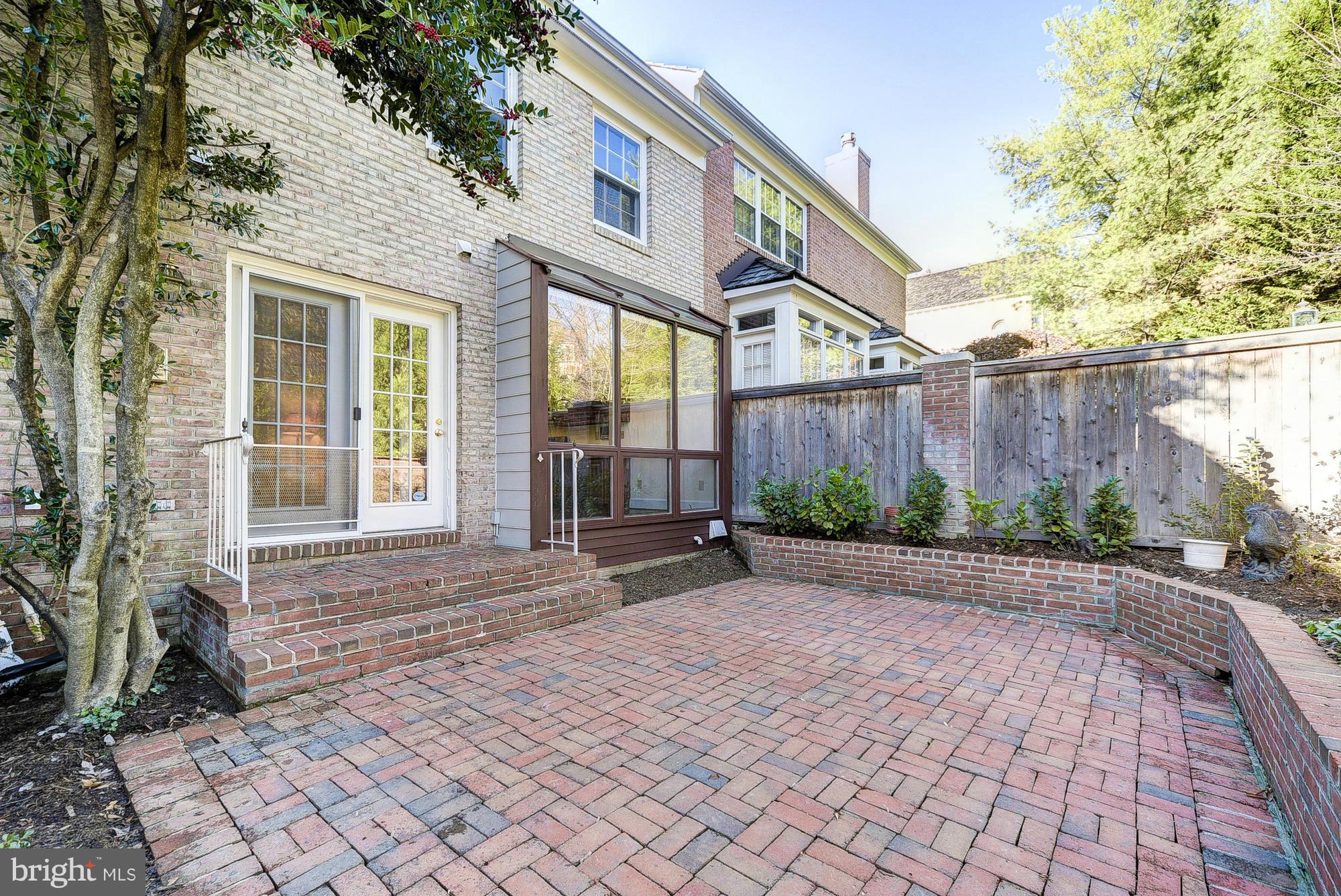 8023 Rising Ridge Road Bethesda, MD 20817 - Photo 29 of 30 a view of a house with a yard