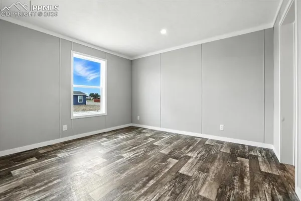 a view of an empty room and window