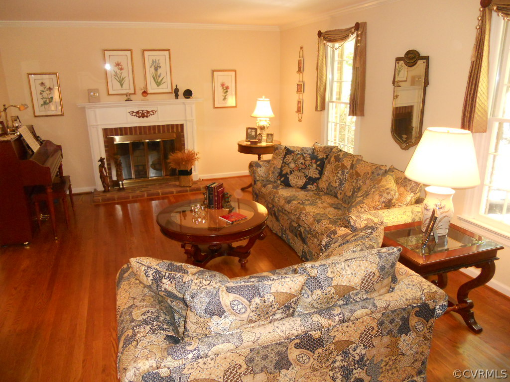 2911 East Brigstock Road Midlothian, VA 23113 - Photo 11 of 20 Formal Living Room with wood-burning fireplace