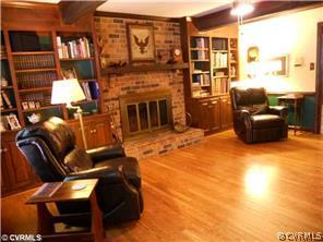 2911 East Brigstock Road Midlothian, VA 23113 - Photo 9 of 20 Family Room with wood-burning fireplace and built-
